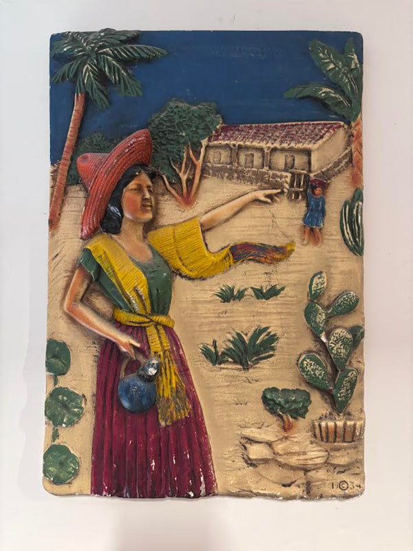 Plaque of a Mexican Woman on a Beach