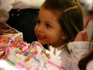 The sugar skull fair – Feria de Alfinique – is a child’s paradise. This little one is so excited to make her sugar skull purchase.